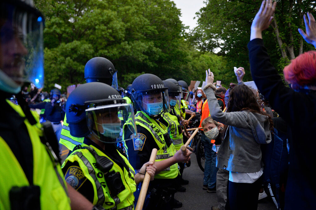 Protesters confront a row of police officers at the conclusion of a peaceful movement where they protested the death of George Floyd and other black lives lost to police racism across the US at Franklin Park in Boston, Massachusetts on June 2, 2020. – Anti-racism protests have put several US cities under curfew to suppress rioting, following the death of George Floyd while in police custody. Photo by JOSEPH PREZIOSO/AFP via Getty Images
